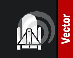White Rocket launch from the spaceport icon isolated on black background. Launch rocket in space. Vector Illustration