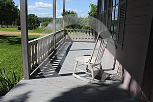 Rocking Chair on a 1850`s House Porch