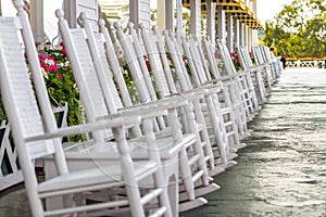 White Rocking Chairs on Long Porch
