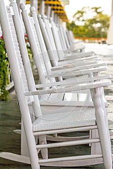 White Rocking Chairs on Long Porch