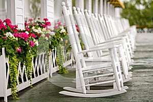 White Rocking Chairs on Long Porch