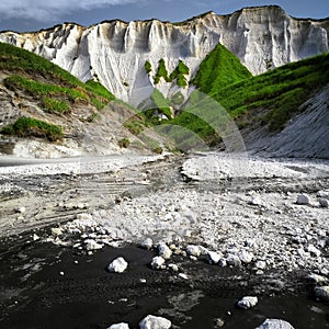 White rocks and the black sand. Iturup, The Russian Kurils Island.