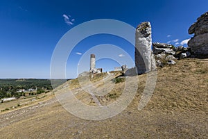 White rocks and ruined medieval castle in Olsztyn, Poland