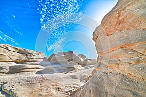 White rocks of Sarakiniko beach, Aegean sea, Milos island , Greece. No people, empty cliffs, summer sunshine, lunar