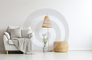 white room concept with floor lamp and wicker pouffe stock