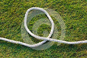 White rope on green lawn