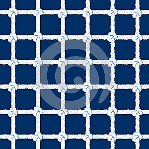 White rope with knots seamless pattern on navy blue background. Marine endless striped illustration with loop ornament.