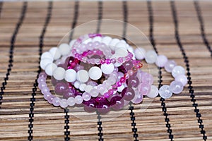 White and rose quartz crystal bracelets