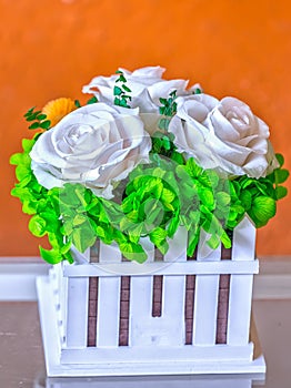 White roses in basket picture beautiful fence