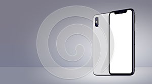 White rotated smartphones similar to iPhone X mockup front and back sides on gray background banner with copy space