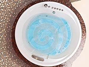 White round jacuzzi with swirling water