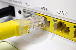 In the white router yellow ports to connect to a computer network, connects the yellow