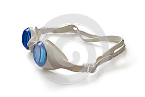 White rubber swimming goggles with blue glasses