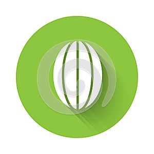 White Rugby ball icon isolated with long shadow. Green circle button. Vector Illustration