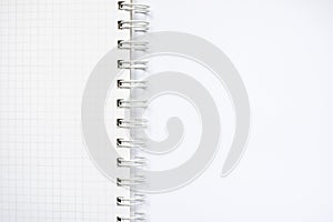 White ruled notebook with ring isolated on white background