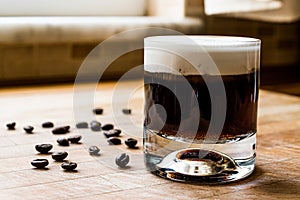 White Russian Cocktail with coffee beans.