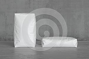 White sacks on the concrete floor. 3d render