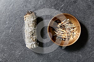 White sage and cup with burnt matches