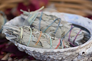 White Sage Smudge Sticks in a Seashell photo