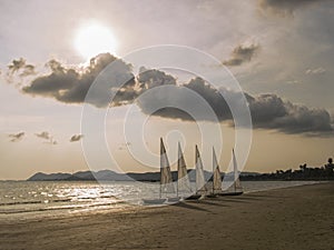 White Sail boat on tropical beach