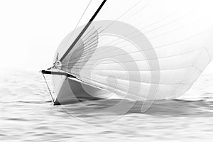 White sailboat with spinnaker