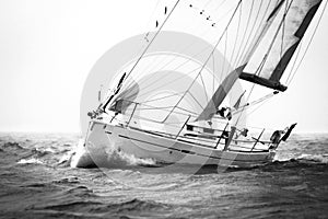 White sailingboat during regatta