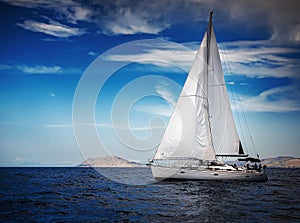 The white sails of yachts