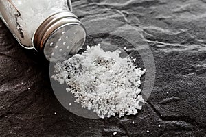 White salt on a black background