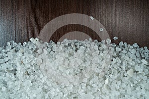 White salt on table background