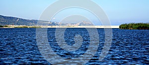 White sand beach with blue sea in Sardinia