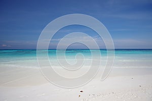 White sand beach and blue sky photo