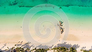 White sand beach and lagoon with turquoise water, aerial view. Boracay island Grotto, Willy`s Rock.