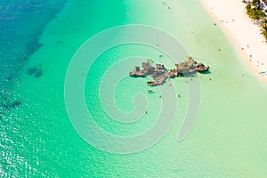 White sand beach and lagoon with turquoise water, aerial view. Boracay island Grotto, Willy`s Rock.