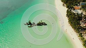 White sand beach and lagoon with turquoise water, aerial view. Boracay island Grotto, Willy`s Rock.