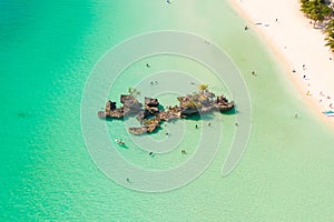 White sand beach and lagoon with turquoise water, aerial view. Boracay island Grotto, Willy`s Rock.