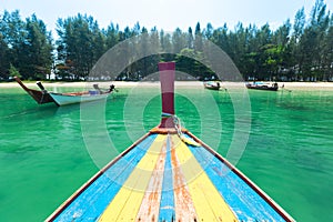 White sand beach and Long-tail boat at Kham-Tok Island koh-kam-tok, The beautiful sea Ranong Province, Thailand