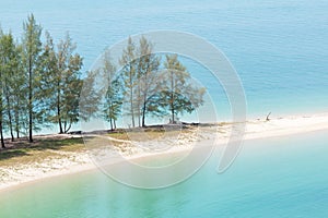 White sand beach and Long-tail boat at Kham-Tok Island koh-kam-tok, The beautiful sea Ranong Province, Thailand