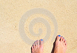 White sand beach top view photo for background. Sunny day by sea on exotic island concept.