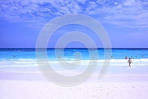 White sand with blue sea and sky