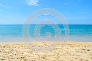 White sand and clear water sea with blue sky at Naiyang beach