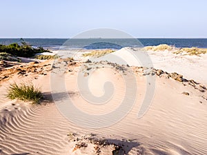 The white sand dunes on a beach