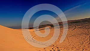 White Sand Dunes with Distant People Jeeps Quads