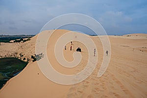 White Sand Dunes Muine in Vietnam with tourists