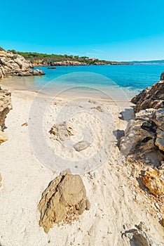 White sand and rocks by the sea in Sardinia