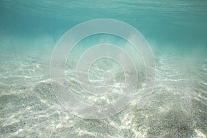 White sand underwater scene at Porthcurno Beach