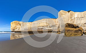 White sandstone cliffs at the Tunnel beach in Dunedin