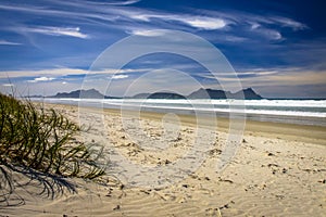 White Sandy Beach With Beautiful Blue Sky at Waipu,New Zealand