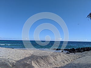 White Sandy Beach and Clear Skies