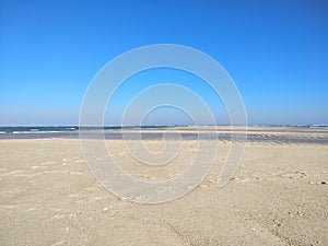 White sandy path through the oceans