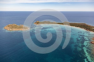 White sandy Sardinian beach with emerald waters. Aerial view photo